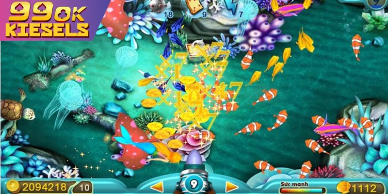 Bắn Cá Vàng: 4 Chiến Thuật Săn Boss Vàng & Jackpot Khủng Áp dụng chiến thuật bắn ria vào đàn cá nhỏ ở góc màn hình.